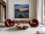 Desert Sunset On Blooming Bush by Kate Jarvik Birch. Shown as extra-large giant wall art in a modern living room. Available as an archival giclee rolled canvas, fine art paper, or poster print. SKU 98560a.