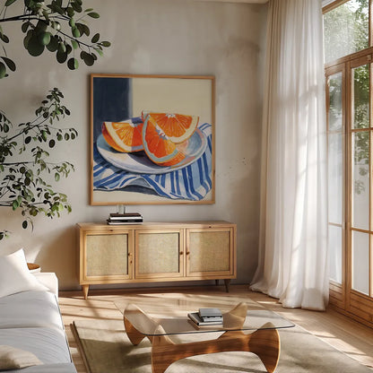 Fresh Cut Citris on Linen by Kate Jarvik Birch. Shown in a natural wood frame in a cozy modern living room. Available as an archival giclee rolled canvas, fine art paper, or poster print. SKU 99741a.