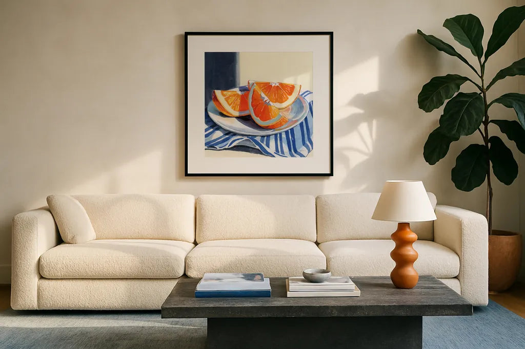 Fresh Cut Citris on Linen by Kate Jarvik Birch. Displayed in a glass frame with matte in a clean modern living room. Available as an archival giclee rolled canvas, fine art paper, or poster print. SKU 99741a.