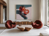 Fresh Sliced Tomato by Kate Jarvik Birch. Shown as extra-large giant wall art in a modern living room. Available as an archival giclee rolled canvas, fine art paper, or poster print. SKU 100953a.