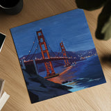 Golden Gate Bridge at Night by Kate Jarvik Birch. Shown as a detailed flat fine art print, highlighting archival giclee quality. Available as an archival giclee rolled canvas, fine art paper, or poster print. SKU 101991a.