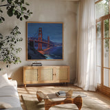 Golden Gate Bridge at Night by Kate Jarvik Birch. Shown in a natural wood frame in a cozy modern living room. Available as an archival giclee rolled canvas, fine art paper, or poster print. SKU 101991a.
