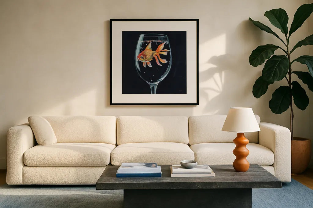 Goldfish In Wine Glass by Kate Jarvik Birch. Displayed in a glass frame with matte in a clean modern living room. Available as an archival giclee rolled canvas, fine art paper, or poster print. SKU 98601a.