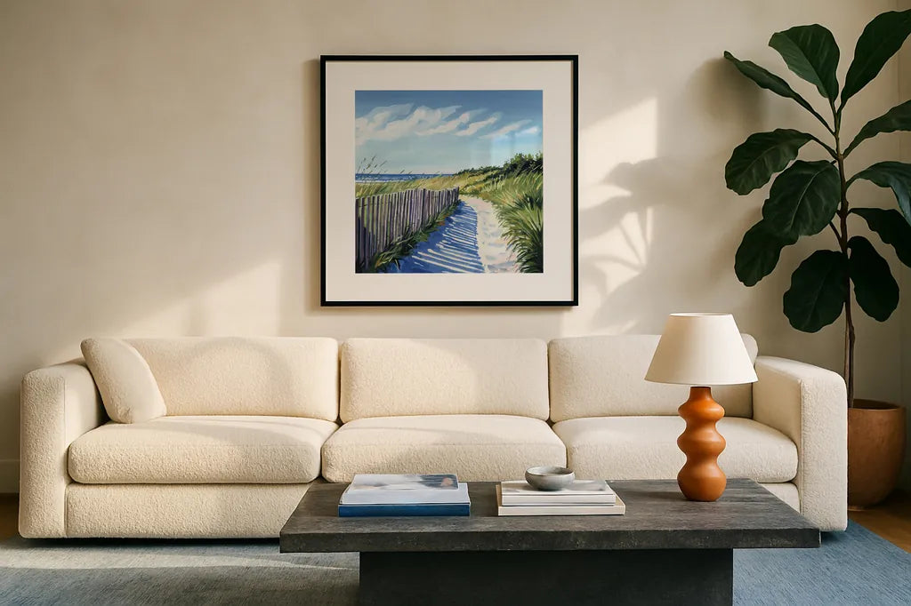 Grassy Path To The Beach II by Kate Jarvik Birch. Displayed in a glass frame with matte in a clean modern living room. Available as an archival giclee rolled canvas, fine art paper, or poster print. SKU 99685a.