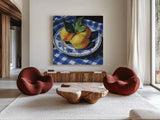 Lemons on a Blue Table by Kate Jarvik Birch. Shown as extra-large giant wall art in a modern living room. Available as an archival giclee rolled canvas, fine art paper, or poster print. SKU 100948a.