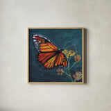 Monarch Feeding by Kate Jarvik Birch. Shown in a natural wood glass frame for a timeless modern aesthetic. Available as an archival giclee rolled canvas, fine art paper, or poster print. SKU 99787a.