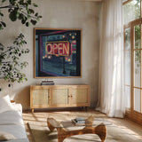 Neon Open Sign by Kate Jarvik Birch. Shown in a natural wood frame in a cozy modern living room. Available as an archival giclee rolled canvas, fine art paper, or poster print. SKU 99558a.