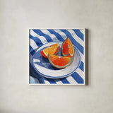 Orange Slices on A Plate by Kate Jarvik Birch. Shown in a crisp white glass frame for a clean and minimalist style. Available as an archival giclee rolled canvas, fine art paper, or poster print. SKU 104889a.