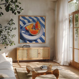 Orange Slices on A Plate by Kate Jarvik Birch. Shown in a natural wood frame in a cozy modern living room. Available as an archival giclee rolled canvas, fine art paper, or poster print. SKU 104889a.