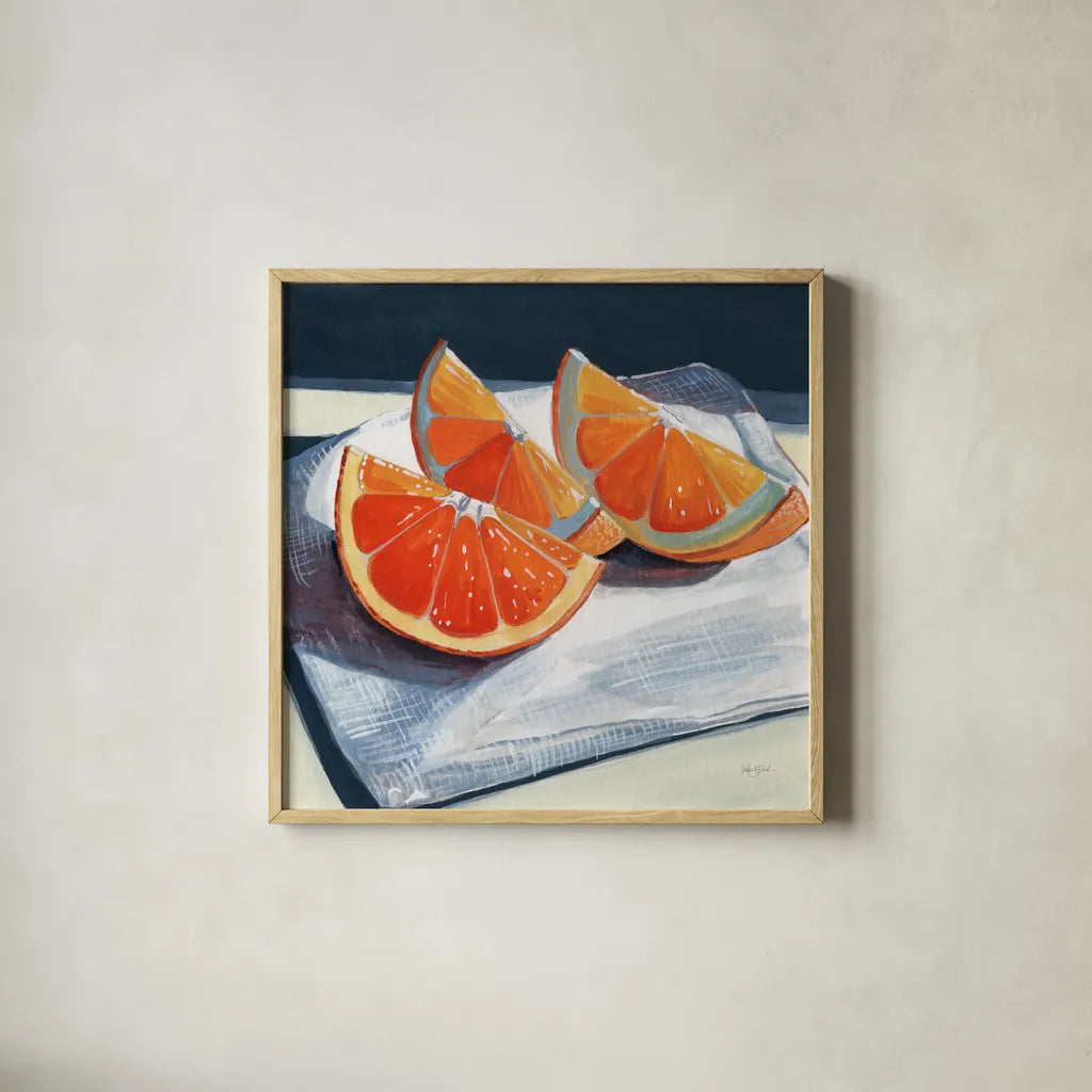 Oranges Catching The Light by Kate Jarvik Birch. Shown in a natural wood glass frame for a timeless modern aesthetic. Available as an archival giclee rolled canvas, fine art paper, or poster print. SKU 99771a.