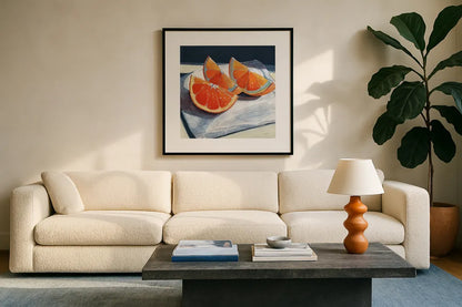 Oranges Catching The Light by Kate Jarvik Birch. Displayed in a glass frame with matte in a clean modern living room. Available as an archival giclee rolled canvas, fine art paper, or poster print. SKU 99771a.