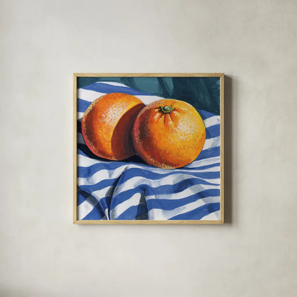 Oranges on Striped Cloth by Kate Jarvik Birch. Shown in a natural wood glass frame for a timeless modern aesthetic. Available as an archival giclee rolled canvas, fine art paper, or poster print. SKU 98607a.