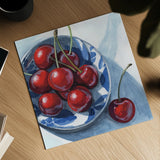 Overhead View of Cherries by Kate Jarvik Birch. Shown as a detailed flat fine art print, highlighting archival giclee quality. Available as an archival giclee rolled canvas, fine art paper, or poster print. SKU 102909a.