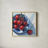Overhead View of Cherries by Kate Jarvik Birch. Shown in a natural wood glass frame for a timeless modern aesthetic. Available as an archival giclee rolled canvas, fine art paper, or poster print. SKU 102909a.