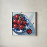 Overhead View of Cherries by Kate Jarvik Birch. Shown in a crisp white glass frame for a clean and minimalist style. Available as an archival giclee rolled canvas, fine art paper, or poster print. SKU 102909a.