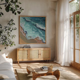 Perfect Soothing Waves by Kate Jarvik Birch. Shown in a natural wood frame in a cozy modern living room. Available as an archival giclee rolled canvas, fine art paper, or poster print. SKU 101982a.