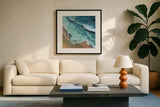 Perfect Soothing Waves by Kate Jarvik Birch. Displayed in a glass frame with matte in a clean modern living room. Available as an archival giclee rolled canvas, fine art paper, or poster print. SKU 101982a.