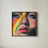 Rainbow Face Paint by Kate Jarvik Birch. Shown in a sleek black glass frame for a contemporary gallery look. Available as an archival giclee rolled canvas, fine art paper, or poster print. SKU 99742a.