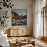 Red Earth Scenery Late Afternoon by Kate Jarvik Birch. Shown in a natural wood frame in a cozy modern living room. Available as an archival giclee rolled canvas, fine art paper, or poster print. SKU 101979a.
