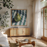 Solo Traveling Pear by Kate Jarvik Birch. Shown in a natural wood frame in a cozy modern living room. Available as an archival giclee rolled canvas, fine art paper, or poster print. SKU 102971a.