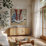 Standing In The Waves by Kate Jarvik Birch. Shown in a natural wood frame in a cozy modern living room. Available as an archival giclee rolled canvas, fine art paper, or poster print. SKU 98532a.