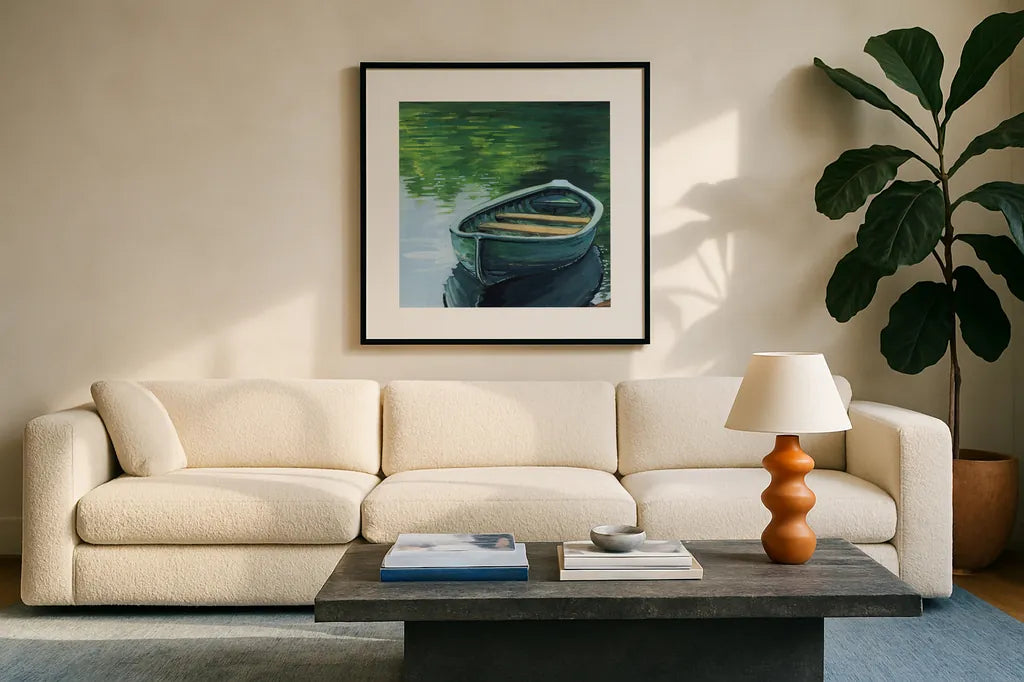 Still Boat in The Lake by Kate Jarvik Birch. Displayed in a glass frame with matte in a clean modern living room. Available as an archival giclee rolled canvas, fine art paper, or poster print. SKU 98533a.