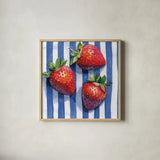 Stripe Cloth Berries by Kate Jarvik Birch. Shown in a natural wood glass frame for a timeless modern aesthetic. Available as an archival giclee rolled canvas, fine art paper, or poster print. SKU 99767a.