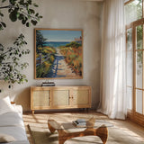 Take Me to The Cape by Kate Jarvik Birch. Shown in a natural wood frame in a cozy modern living room. Available as an archival giclee rolled canvas, fine art paper, or poster print. SKU 101981a.