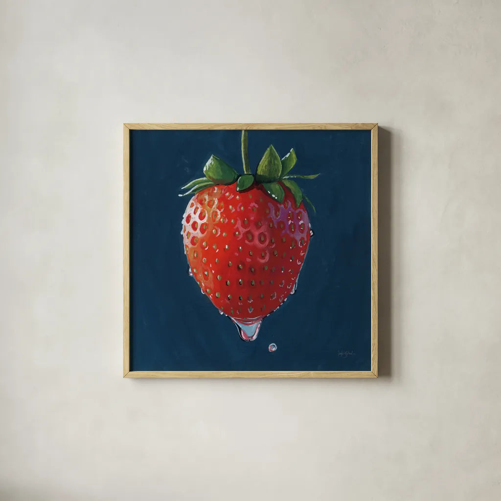 The Most Perfect Strawberry by Kate Jarvik Birch. Shown in a natural wood glass frame for a timeless modern aesthetic. Available as an archival giclee rolled canvas, fine art paper, or poster print. SKU 98625a.