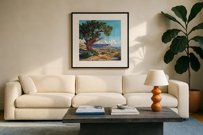 The Wind Shapes The Tree by Kate Jarvik Birch. Displayed in a glass frame with matte in a clean modern living room. Available as an archival giclee rolled canvas, fine art paper, or poster print. SKU 102970a.