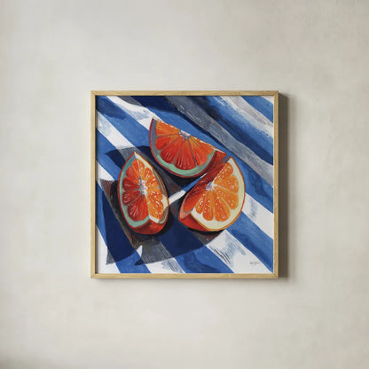 Three Citrus Slices II by Kate Jarvik Birch. Shown in a natural wood glass frame for a timeless modern aesthetic. Available as an archival giclee rolled canvas, fine art paper, or poster print. SKU 101994a.