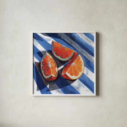 Three Citrus Slices II by Kate Jarvik Birch. Shown in a crisp white glass frame for a clean and minimalist style. Available as an archival giclee rolled canvas, fine art paper, or poster print. SKU 101994a.