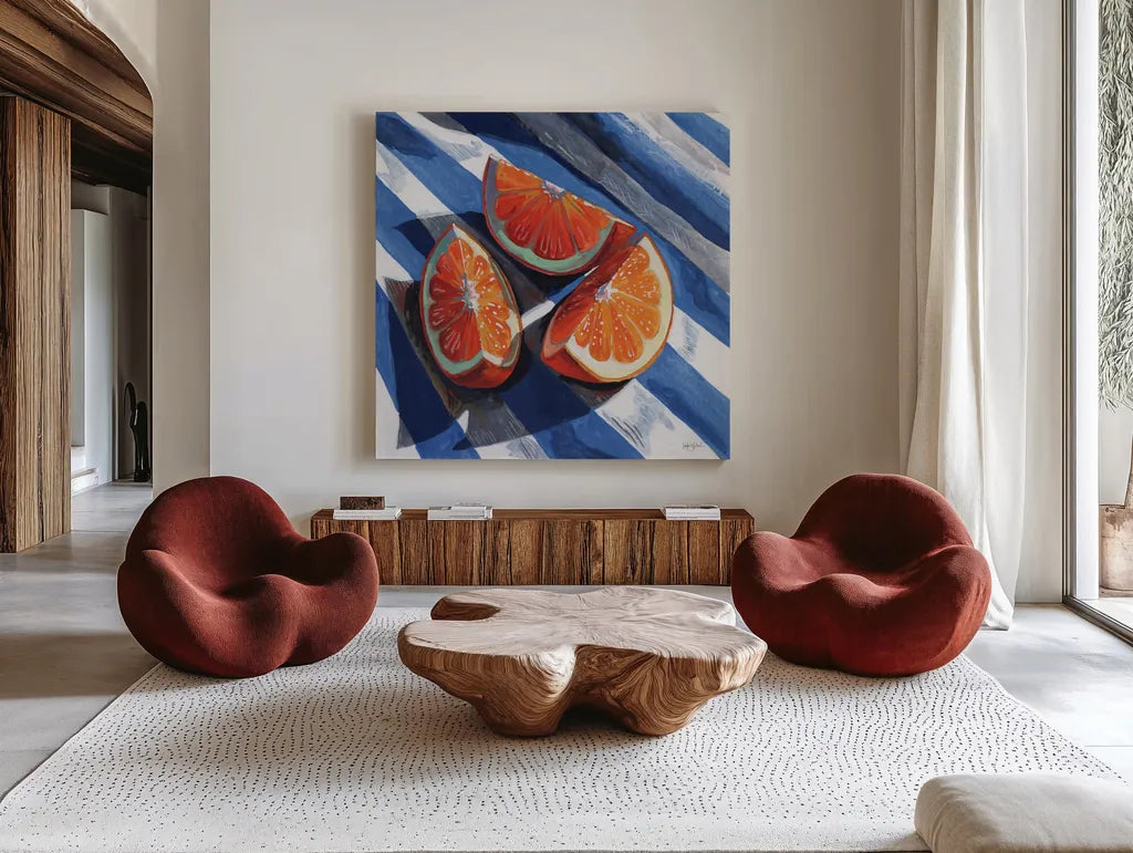 Three Citrus Slices II by Kate Jarvik Birch. Shown as extra-large giant wall art in a modern living room. Available as an archival giclee rolled canvas, fine art paper, or poster print. SKU 101994a.