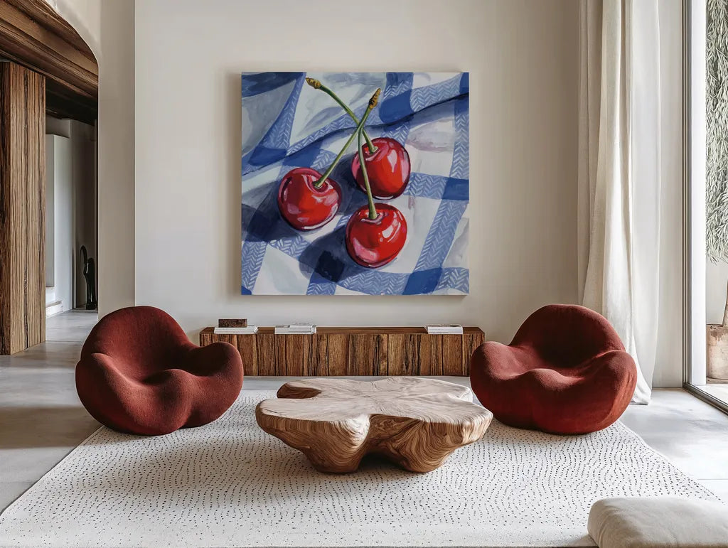 Three Picnic Cherries by Kate Jarvik Birch. Shown as extra-large giant wall art in a modern living room. Available as an archival giclee rolled canvas, fine art paper, or poster print. SKU 98619a.