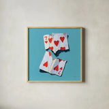 Torn Seven of Hearts by Kate Jarvik Birch. Shown in a natural wood glass frame for a timeless modern aesthetic. Available as an archival giclee rolled canvas, fine art paper, or poster print. SKU 98603a.