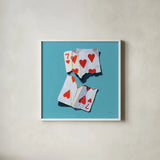 Torn Seven of Hearts by Kate Jarvik Birch. Shown in a crisp white glass frame for a clean and minimalist style. Available as an archival giclee rolled canvas, fine art paper, or poster print. SKU 98603a.