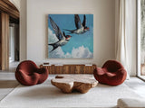 Two Birds in The Clouds by Kate Jarvik Birch. Shown as extra-large giant wall art in a modern living room. Available as an archival giclee rolled canvas, fine art paper, or poster print. SKU 99769a.