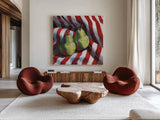 Two Pears on a Striped Cloth by Kate Jarvik Birch. Shown as extra-large giant wall art in a modern living room. Available as an archival giclee rolled canvas, fine art paper, or poster print. SKU 100949a.
