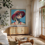 Vacation In Style by Kate Jarvik Birch. Shown in a natural wood frame in a cozy modern living room. Available as an archival giclee rolled canvas, fine art paper, or poster print. SKU 98540a.