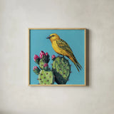 Yellow Bird on Cacti Bloom by Kate Jarvik Birch. Shown in a natural wood glass frame for a timeless modern aesthetic. Available as an archival giclee rolled canvas, fine art paper, or poster print. SKU 98543a.