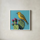 Yellow Bird on Cacti Bloom by Kate Jarvik Birch. Shown in a crisp white glass frame for a clean and minimalist style. Available as an archival giclee rolled canvas, fine art paper, or poster print. SKU 98543a.
