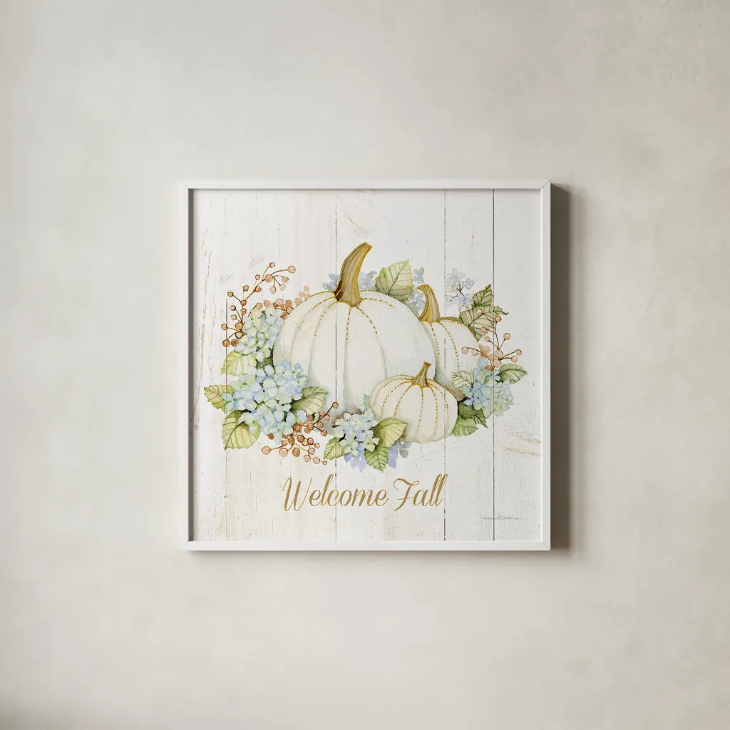Autumn Elegance I Gold Welcome Fall by Kathleen Parr McKenna. Shown in a crisp white glass frame for a clean and minimalist style. Available as an archival giclee rolled canvas, fine art paper, or poster print. SKU 29216a.
