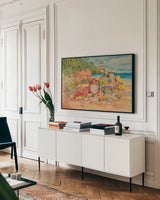Bayside Picnic by Kathleen Parr McKenna. shown as a framed stretched canvas in a living room above a console. Available as a archival giclee rolled canvas, fine art paper, or poster print. SKU 47968i.