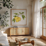 Citrus Garden I Shiplap by Kathleen Parr McKenna. Shown in a natural wood frame in a cozy modern living room. Available as an archival giclee rolled canvas, fine art paper, or poster print. SKU 47404a.