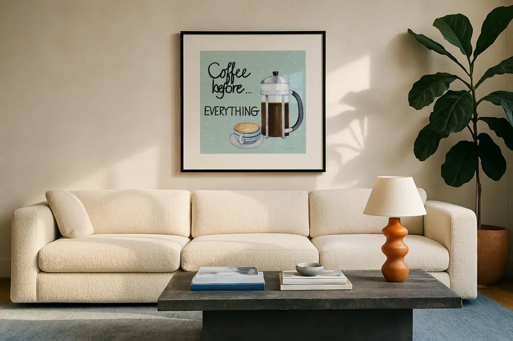 Coffee Before Everything Blue by Kathleen Parr McKenna. Displayed in a glass frame with matte in a clean modern living room. Available as an archival giclee rolled canvas, fine art paper, or poster print. SKU 56997a.