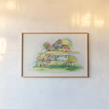 Flower Cart by Kathleen Parr McKenna. shown as a paper print in a natural frame. Available as a archival giclee rolled canvas, fine art paper, or poster print. SKU 41206i.