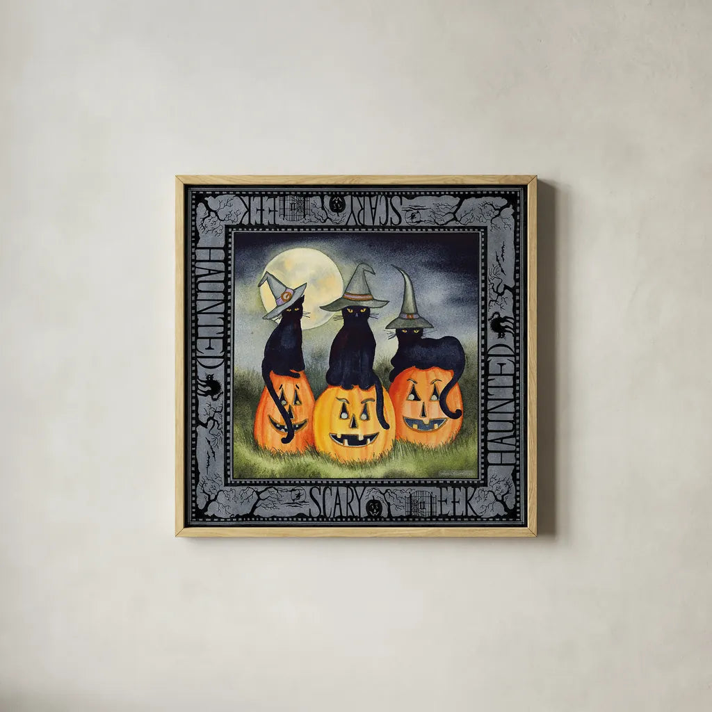 Haunting Halloween Night II by Kathleen Parr McKenna. Shown in a natural wood glass frame for a timeless modern aesthetic. Available as an archival giclee rolled canvas, fine art paper, or poster print. SKU 39664a.