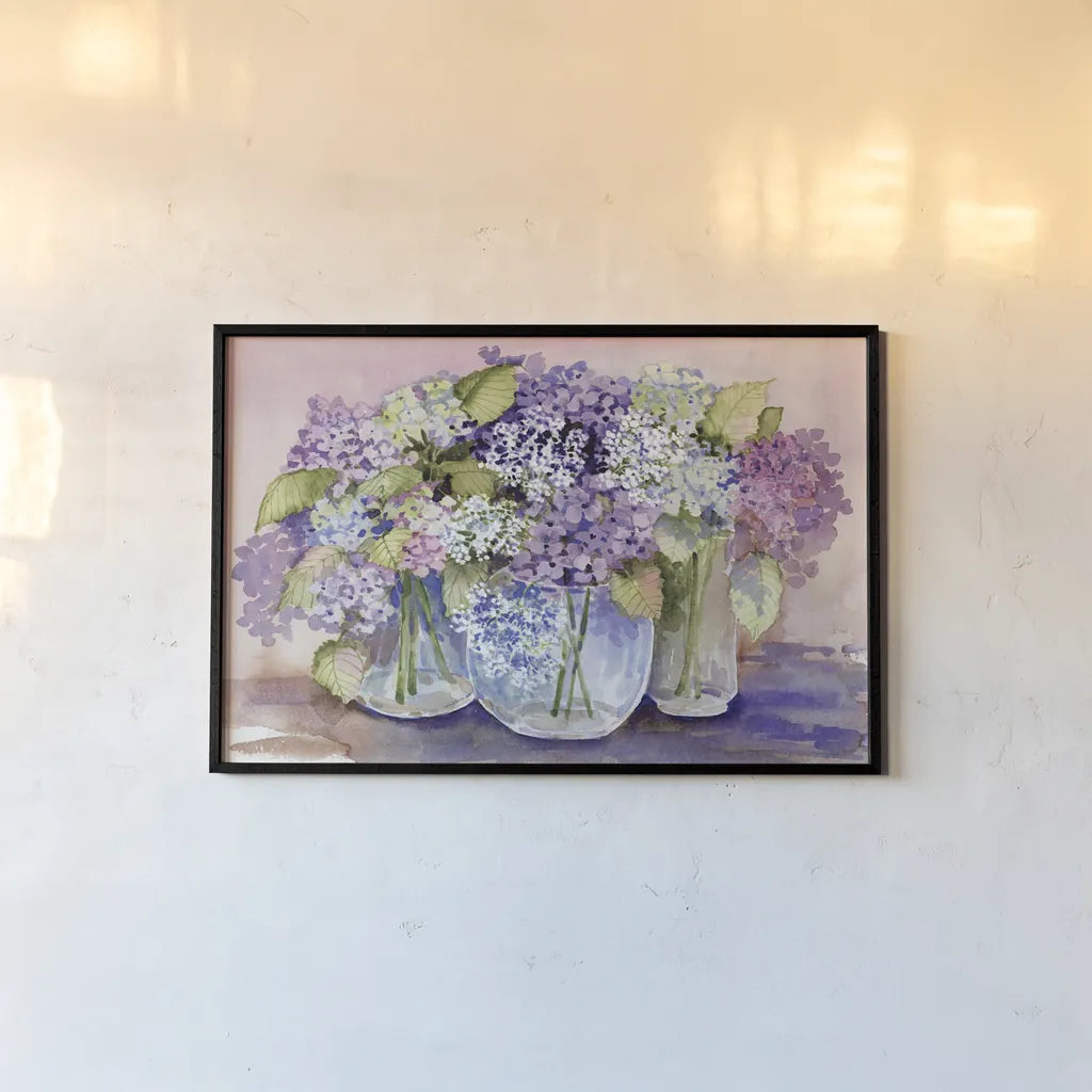 Hydrangeas In Glass by Kathleen Parr McKenna. shown as a paper print in a black flame. Available as a archival giclee rolled canvas, fine art paper, or poster print. SKU 88421i.