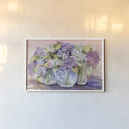 Hydrangeas In Glass by Kathleen Parr McKenna. shown as a paper print in a white frame. Available as a archival giclee rolled canvas, fine art paper, or poster print. SKU 88421i.