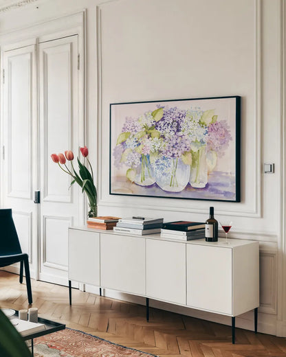 Hydrangeas in Glass Light by Kathleen Parr McKenna. shown as a framed stretched canvas in a living room above a console. Available as a archival giclee rolled canvas, fine art paper, or poster print. SKU 89987i.